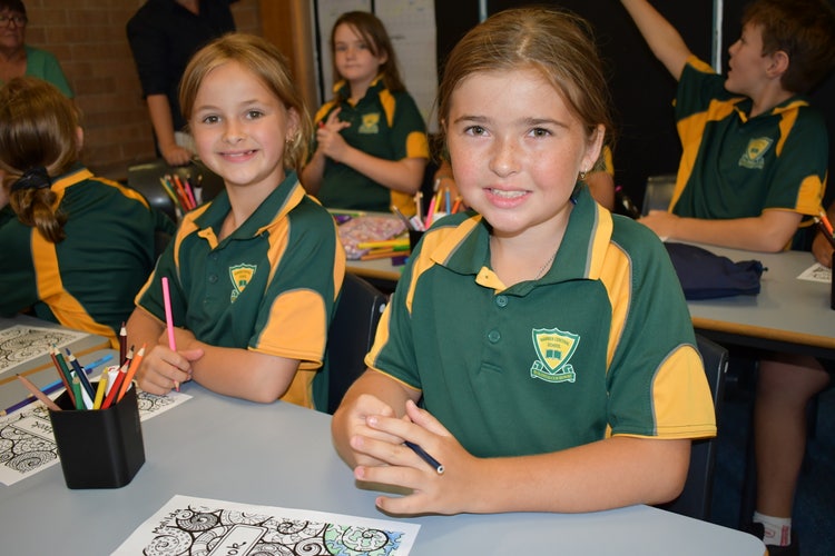 Two students in class, Bridie and Matilda.